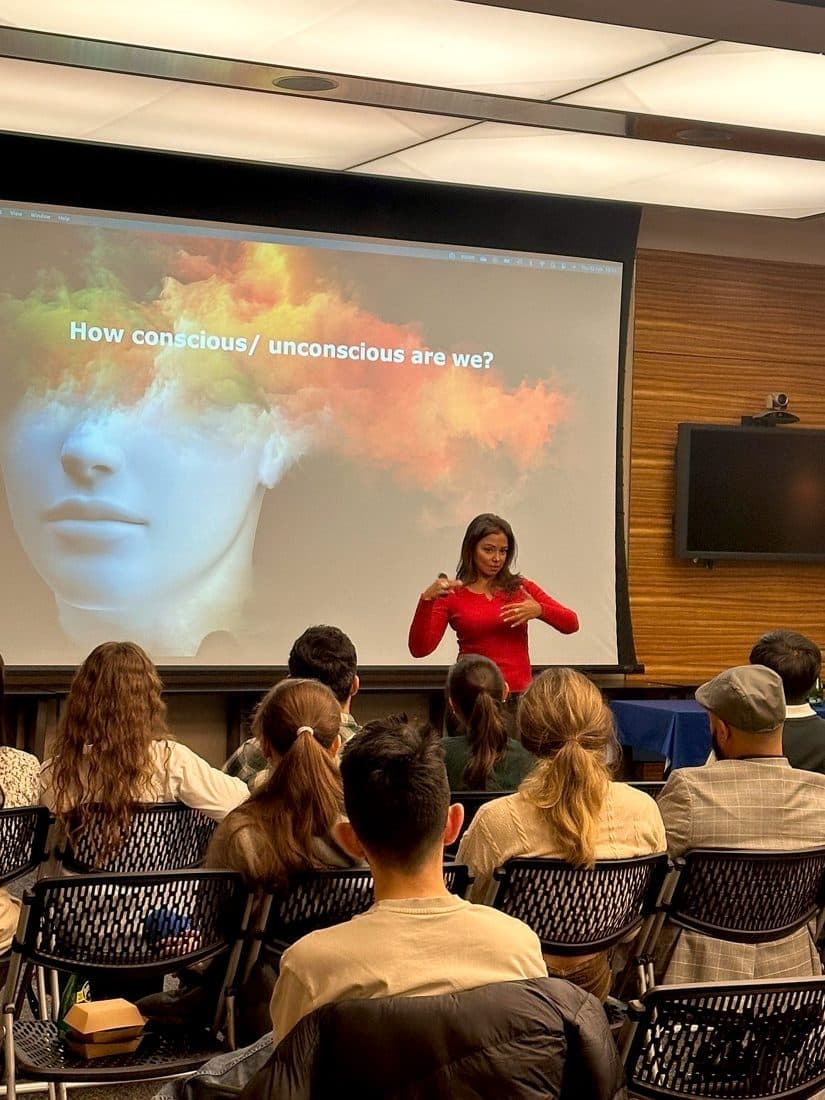 Sam asking an audience how conscious we really are